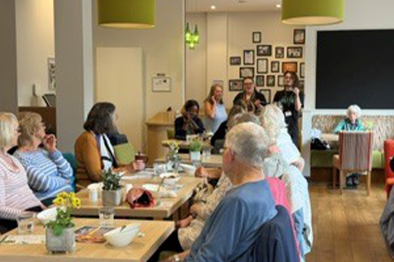 local residents enjoying a special community lunch 