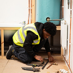 student learning plumbing