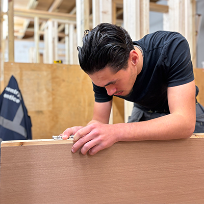 Student in construction workshop